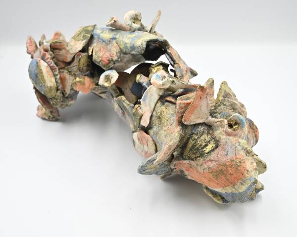 - a , Ceramic Sculpture by Dorienne Carmel, measuring 17 x 39 cm (H x W) £185